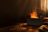 Llamora, difusor de aroma con efecto llama, sobre mesa de madera en ambiente de otoño